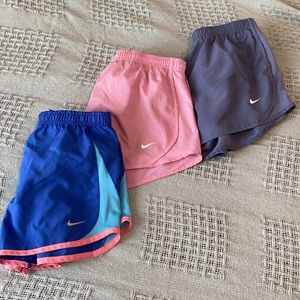 3 Pairs of Girls Nike Dri Fit Running Shorts (pink, grey, blue) Size Medium